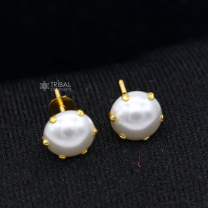 Exclusive round pearl stud earring in 14kt yellow gold by TRIBAL ORNAMENTS, unisex jewelry from India.