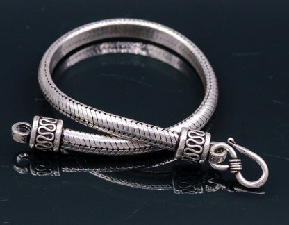 Sterling silver handmade snake chain bracelet by Tribal Ornaments, 6 to 8.5 inches, D-shape, unisex, 6mm thickness, customizable.