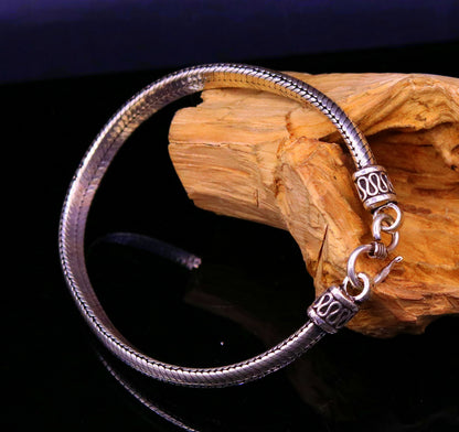 Sterling silver handmade snake chain bracelet, 6mm thick, D shape, unisex design, 6 to 8.5 inches, crafted by Tribal Ornaments.