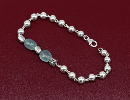Unisex 925 sterling silver handmade aqua quartz stone beaded bracelet with intricate silver accents, from Tribal Ornaments India.
