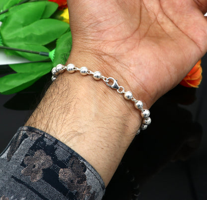 Handmade 925 sterling silver aqua quartz stone beaded bracelet, unisex jewelry from Tribal Ornaments, 6 to 8.5 inches long.