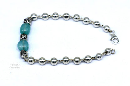 Handmade 925 sterling silver aqua quartz beaded bracelet from Tribal Ornaments, showcasing vibrant blue stones and intricate silver details.