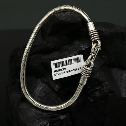 Sterling silver handmade snake chain bracelet, flexible and customizable, unisex tribal jewelry from TRIBAL ORNAMENTS.
