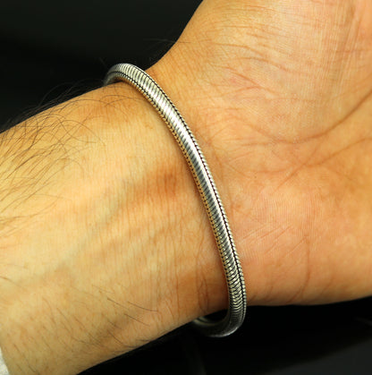 Handmade 925 sterling silver snake chain bracelet, flexible and unisex, featuring tribal design and customizable length for personalized style.