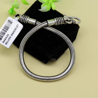 Sterling silver unisex snake chain bracelet, handmade, customized with personalized design, from TRIBAL ORNAMENTS.