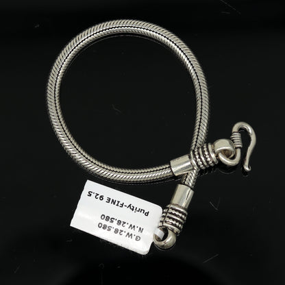Unisex 925 sterling silver snake chain bracelet with handmade, personalized design, featuring intricate craftsmanship.