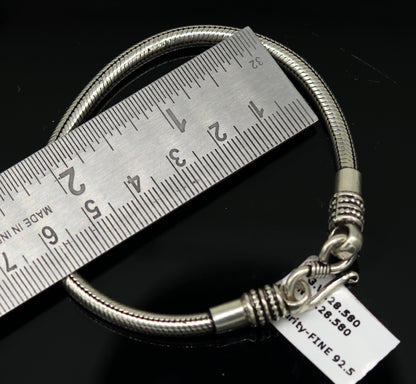 Unisex 6-inch 925 sterling silver snake chain bracelet with custom design, handcrafted jewelry from Tribal Ornaments.