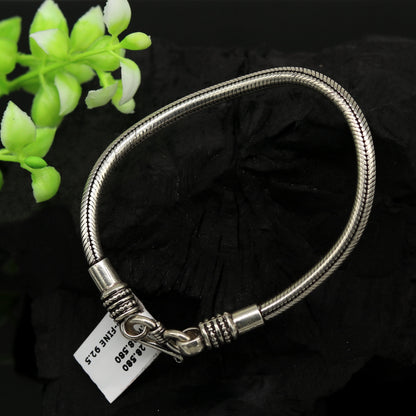 Unisex 925 sterling silver snake chain bracelet with customized design, handmade tribal jewelry, perfect for personalized gifting.