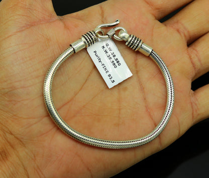 925 sterling silver snake chain bracelet by TRIBAL ORNAMENTS, unisex personalized jewelry with a sleek, handmade design.