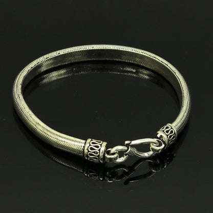 Sterling silver handmade snake chain bracelet with D-shape design, customizable half-round style, ideal for personalized jewelry gifting.