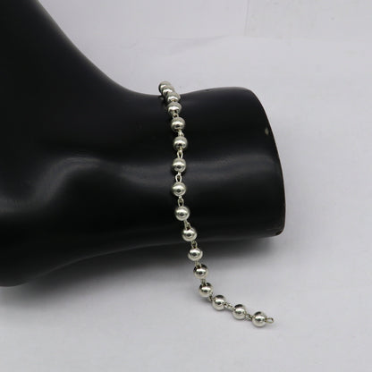 Sterling silver handmade beaded unisex bracelet with 5.5 mm round beads, 8-inch length, stylish and customizable jewelry.