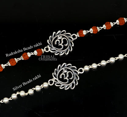 Sterling silver OM Rudraksha and beads bracelet rakhi with divine Aum design, crafted by TRIBAL ORNAMENTS.