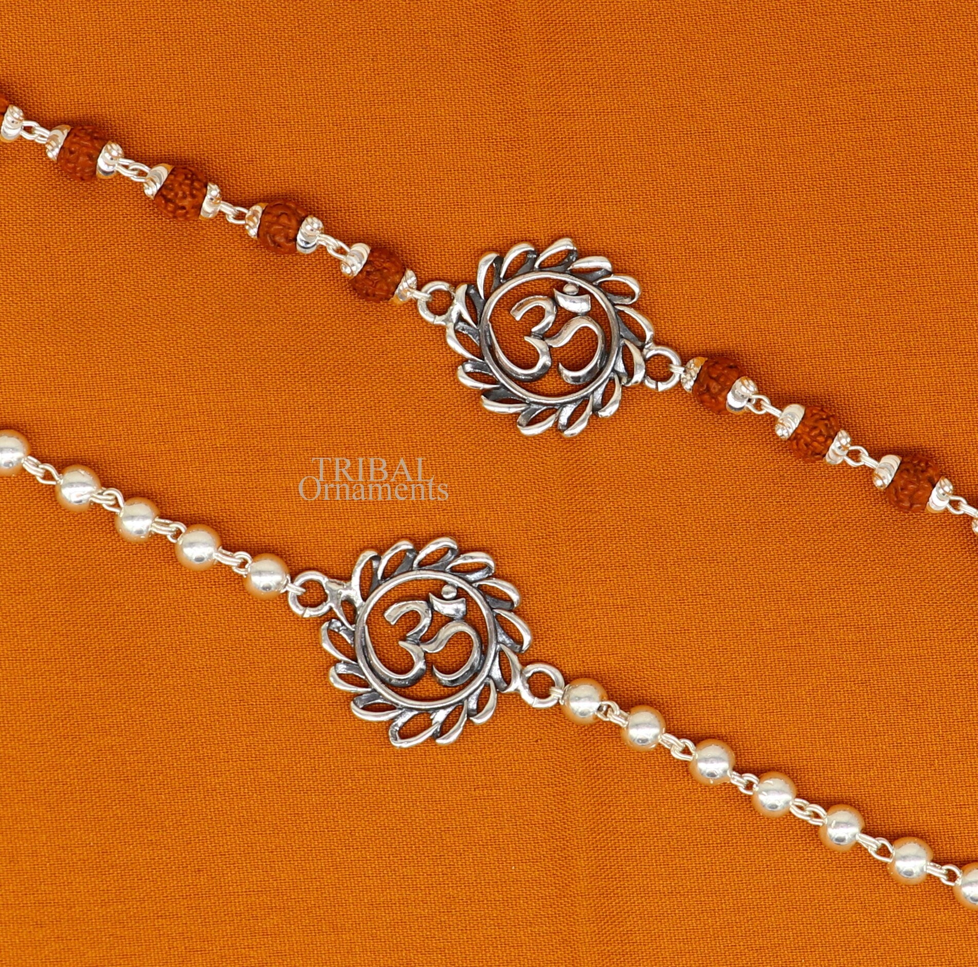 925 Sterling silver OM Rudraksha bracelet with silver beads, featuring divine Aum symbol, handcrafted by TRIBAL ORNAMENTS.