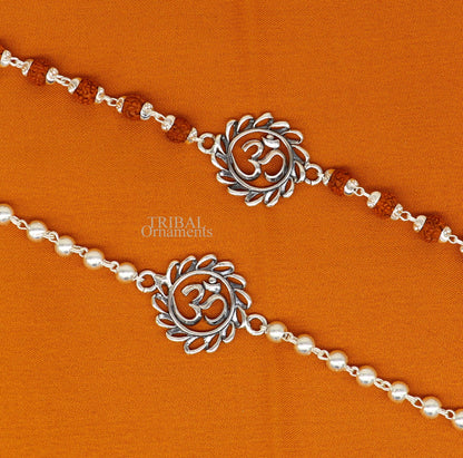 925 Sterling silver OM Rudraksha bracelet with silver beads, featuring divine Aum symbol, handcrafted by TRIBAL ORNAMENTS.
