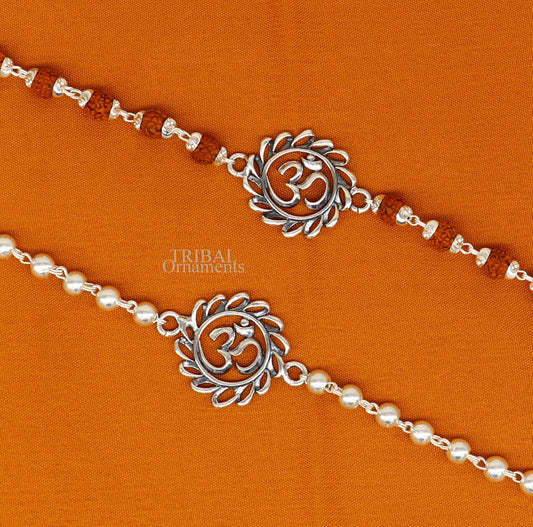 925 Sterling silver OM Rudraksha bracelet with silver beads, featuring divine Aum symbol, handcrafted by TRIBAL ORNAMENTS.
