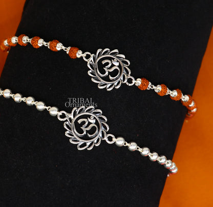 925 Sterling silver OM Rudraksha and silver beads bracelet rakhi with intricate design, featuring divine Aum symbol and traditional craftsmanship
