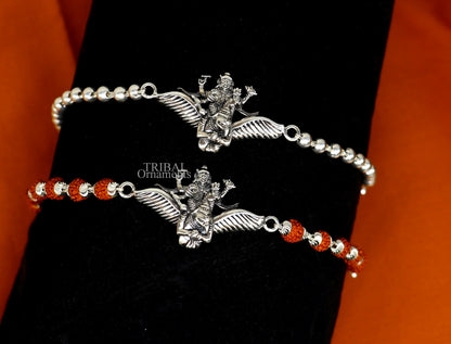 Sterling silver Lord Vishnu bracelet with Garuda, Rudraksha beads, and silver accents, crafted by TRIBAL ORNAMENTS.