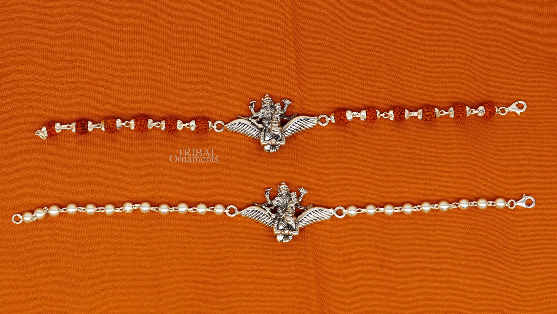 Sterling silver Lord Vishnu bracelet with Garuda, Rudraksha beads, and silver accents, crafted by TRIBAL ORNAMENTS.