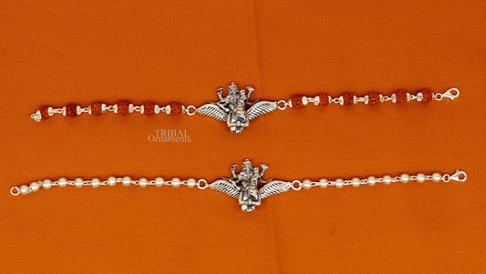 Sterling silver Lord Vishnu bracelet with Garuda, Rudraksha beads, and silver accents, crafted by TRIBAL ORNAMENTS.
