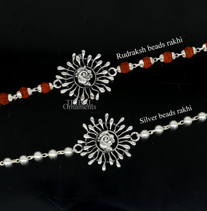 925 Sterling silver Ganesha design Rudraksha beads bracelet rakhi with intricate craftsmanship and traditional motifs.