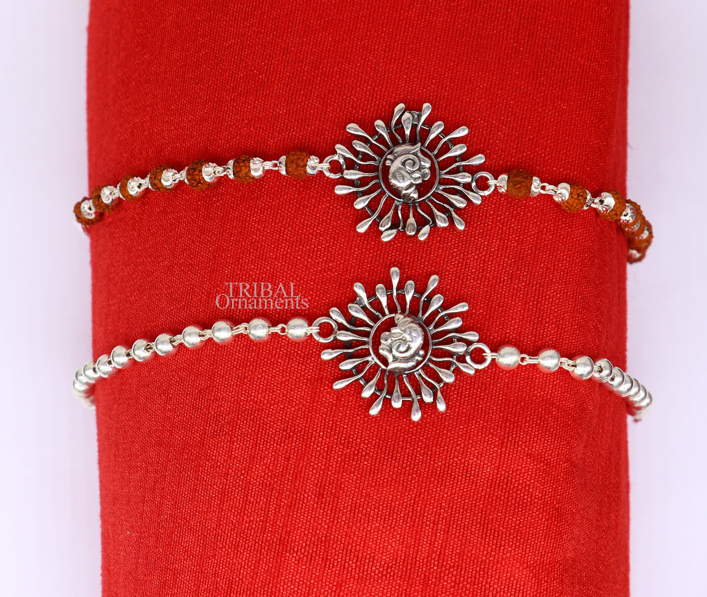 925 Sterling silver Ganesha design Rudraksha beads bracelet Rakhi with intricate tribal ornament details.