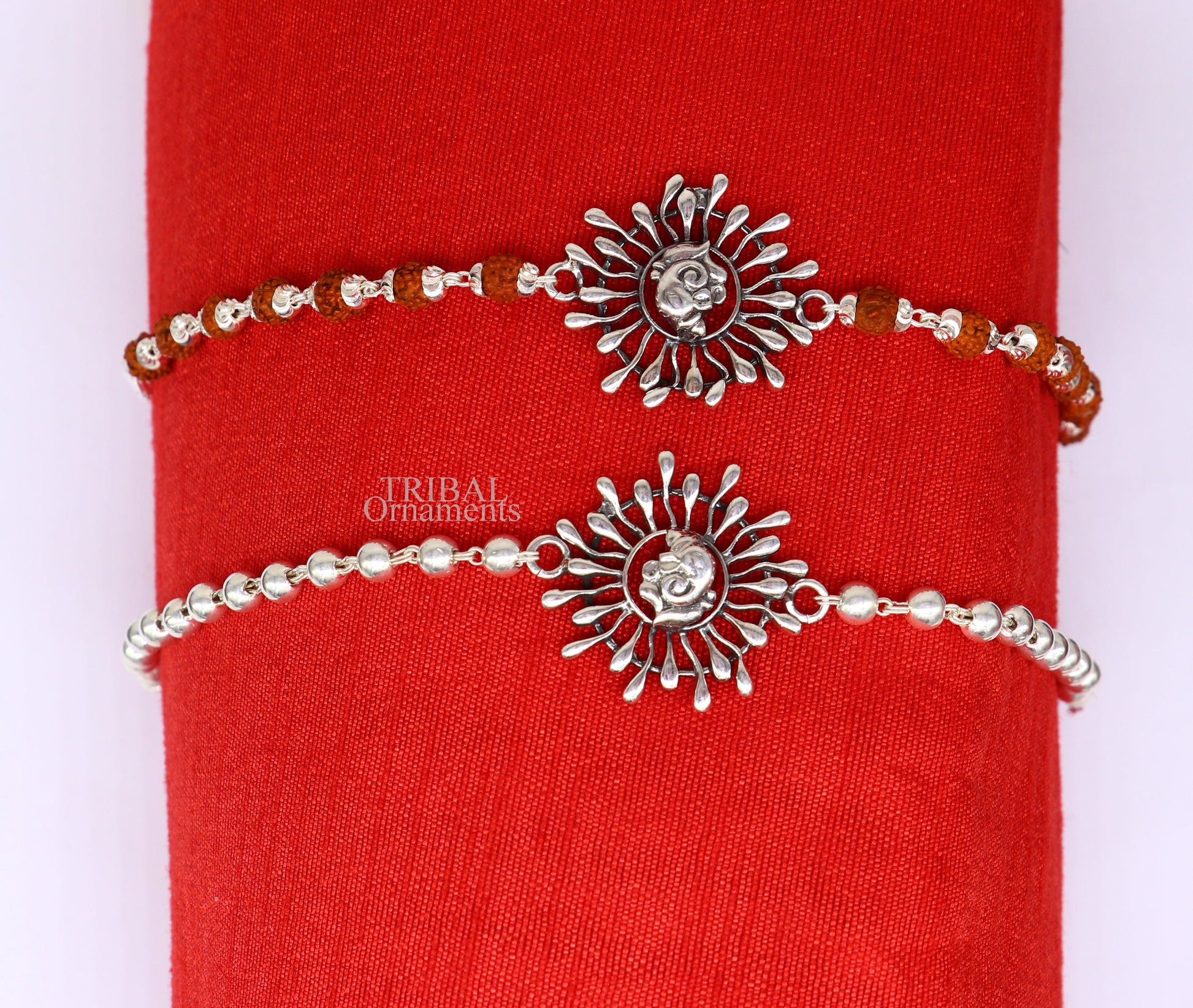 925 Sterling silver Ganesha design Rudraksha beads bracelet Rakhi with intricate tribal ornament details.