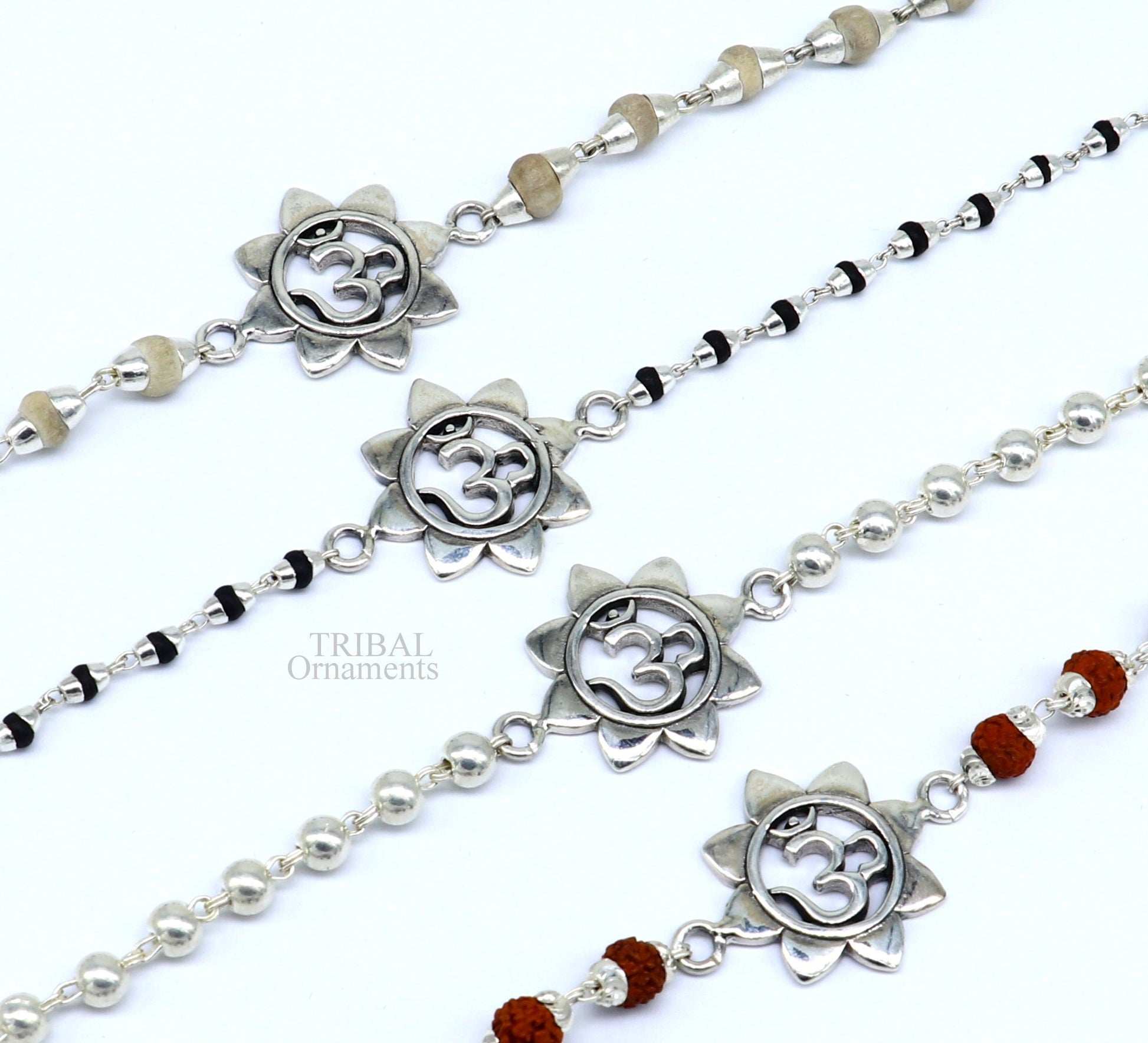 925 silver Rudraksha and Tulsi beaded bracelet with flower OM design, handcrafted by Tribal Ornaments.