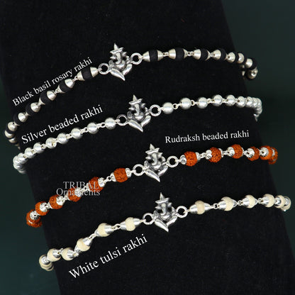 Sterling silver handmade Lord Ganesha bracelet with Rudraksha or Tulsi beads, featuring intricate tribal design by TRIBAL ORNAMENTS.