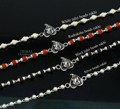 Sterling silver Lord Ganesha on Paan design Rudraksha and Tulsi bead bracelet with handmade craftsmanship and intricate details.