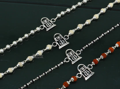 Sterling silver Lord Shiva lingam Rudraksha and Tulsi beaded bracelet with handmade tribal design.