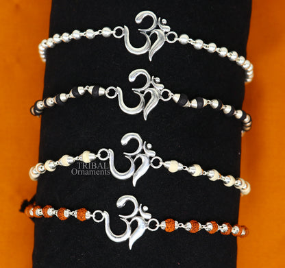 925 sterling silver Rudraksha and Tulsi beaded bracelet with OM design, handmade tribal ornaments for spiritual wrist adornment.