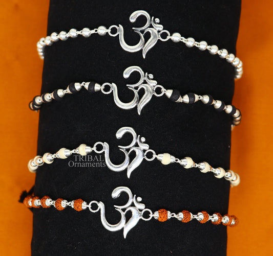 925 sterling silver Rudraksha and Tulsi beaded bracelet with OM design, handmade tribal ornaments for spiritual wrist adornment.