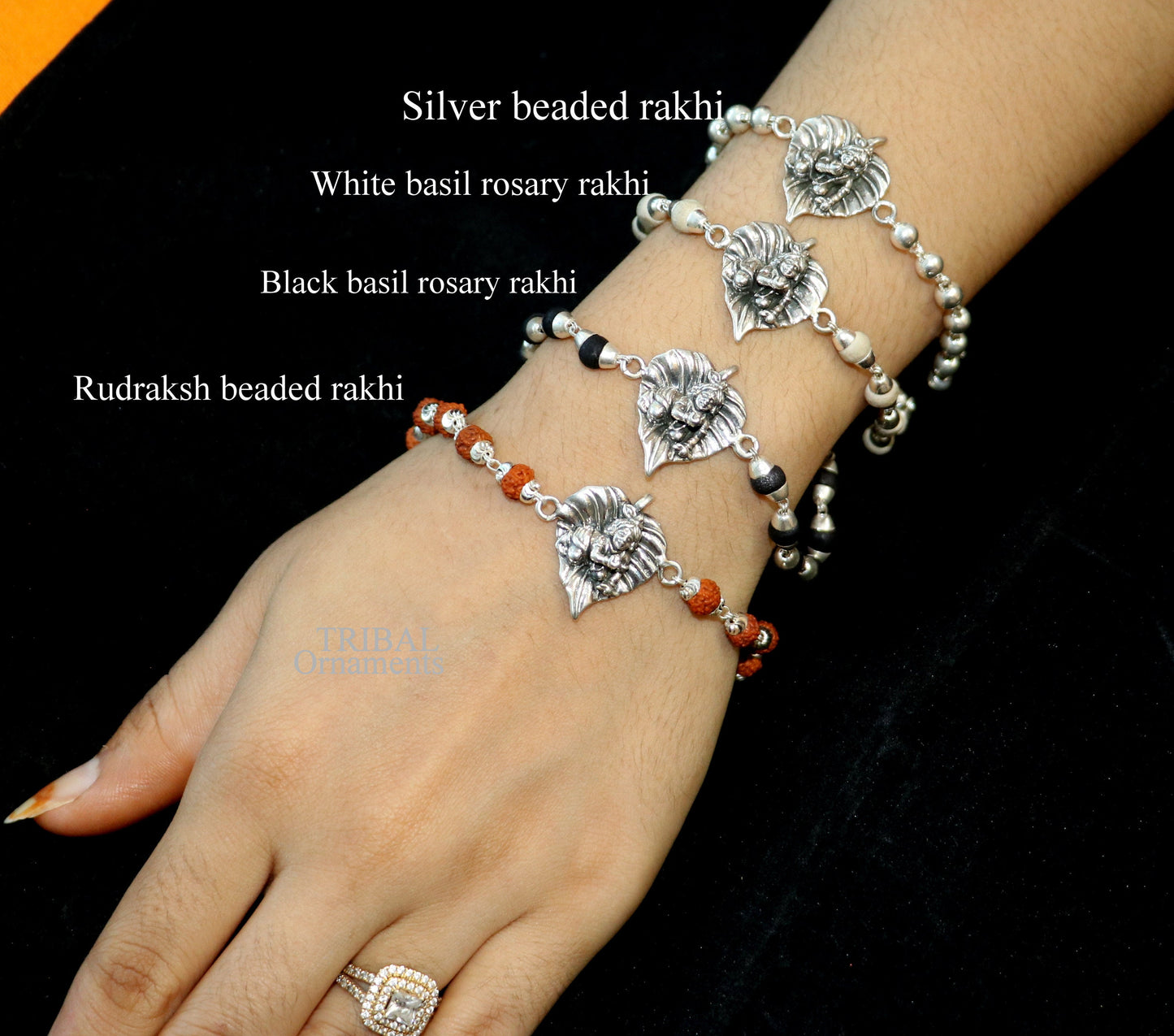 925 sterling silver Laddu Gopala bracelet with Rudraksha and Tulsi beads, featuring a detailed Krishna design, by Tribal Ornaments.