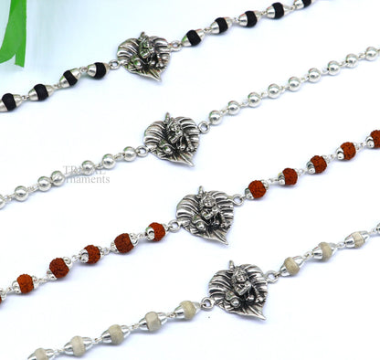925 sterling silver Laddu Gopala design bracelet with Rudraksha and Tulsi beads, featuring intricate Krishna-themed jewelry by TRIBAL ORNAMENTS
