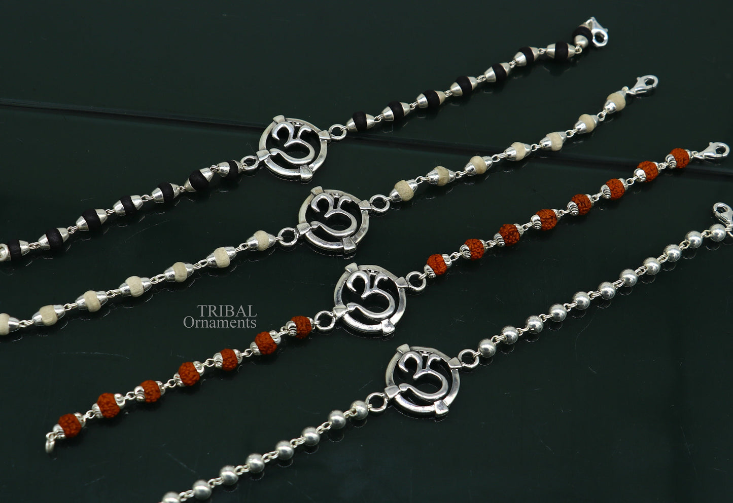925 sterling silver OM design Rudraksha and Tulsi beaded bracelet with intricate mantra accents and traditional rakhi style.