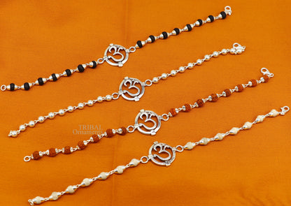 925 sterling silver Rudraksha bead bracelet with OM design, featuring Tulsi beads, crafted by TRIBAL ORNAMENTS.