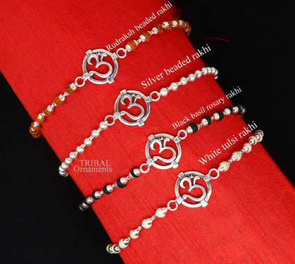 925 sterling silver OM design Rudraksha beaded bracelet with Tulsi beads, featuring intricate mantra and sacred symbols, handmade jewelry.