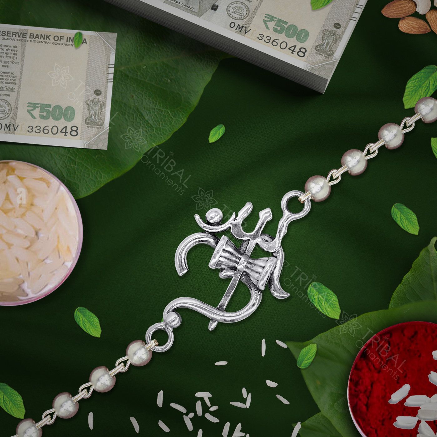 Sterling silver Om Rudraksha bracelet with black and white Tulsi beads and silver beads, featuring a beaded chain design.