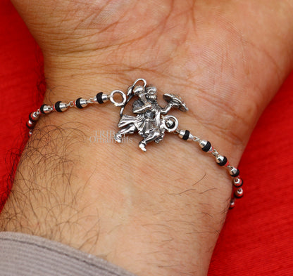 Sterling silver Flying Hanuman Rudraksha and Tulsi beads bracelet Rakhi with intricate bead design and detailed silver accents.