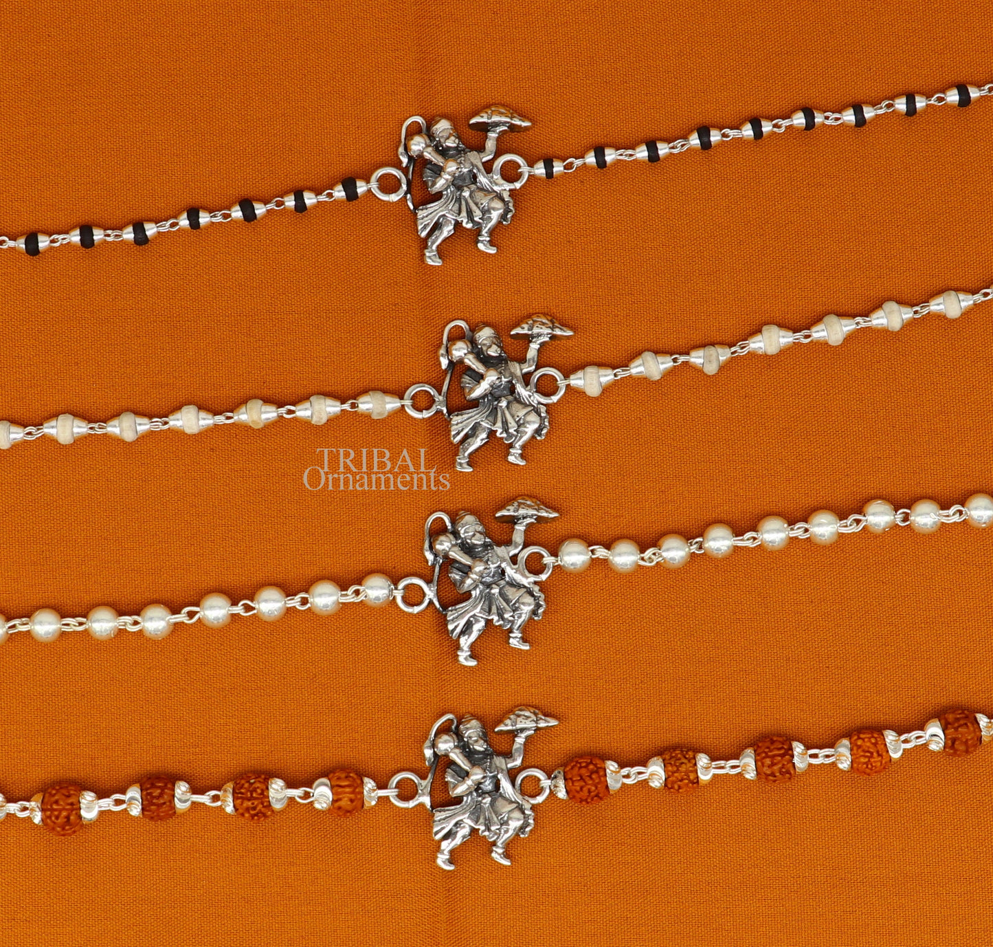 925 sterling silver Flying Hanuman Rudraksha and Tulsi beads bracelet rakhi with intricate silver detailing and beaded accents.