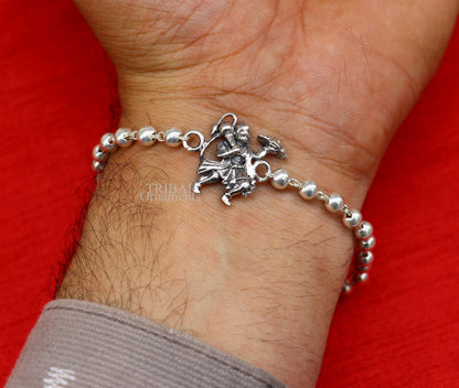 925 sterling silver Flying Hanuman Rudraksha and Tulsi beads bracelet rakhi with intricate silver details and beaded design.