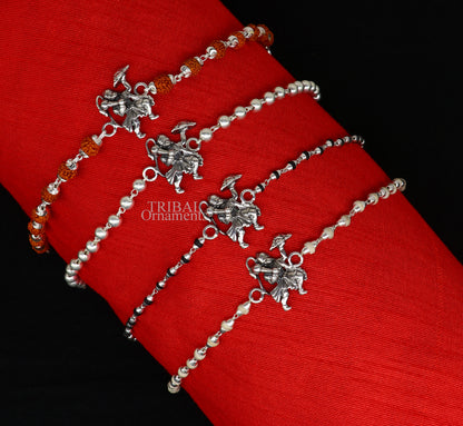 925 sterling silver Flying Hanuman Rudraksha and Tulsi beads bracelet rakhi with intricate silver details and beaded design.