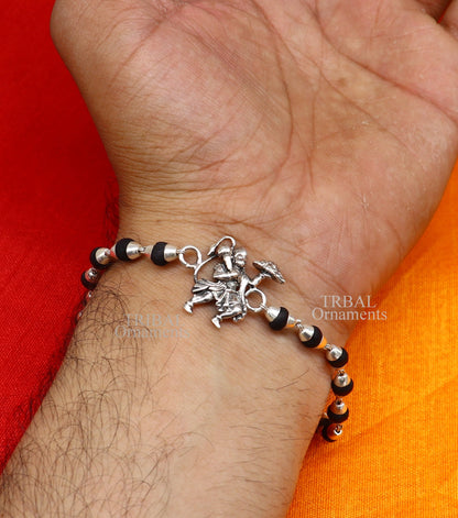 Sterling silver Lord Hanuman Rudraksha and Tulsi bead bracelet by Tribal Ornaments, featuring intricate beaded design and spiritual symbols.