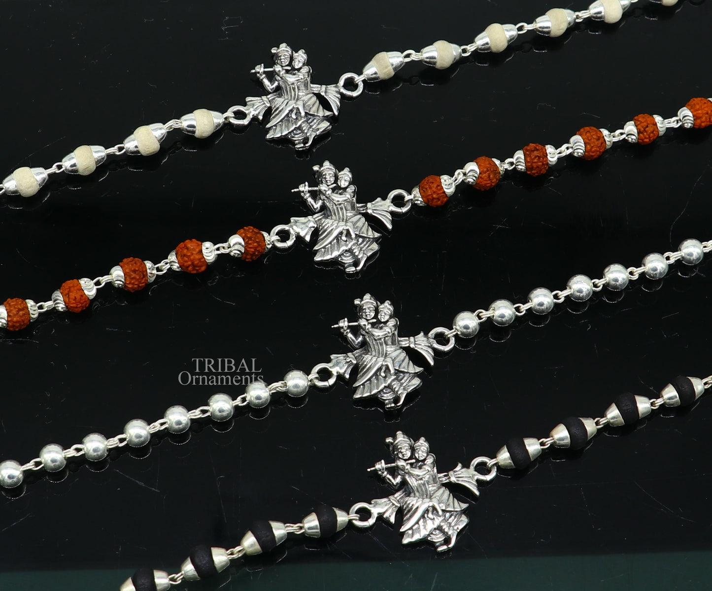Handmade 925 sterling silver Lord Radha Krishna Rudraksha and Tulsi beads bracelet rakhi from Tribal Ornaments, divine and intricate design.