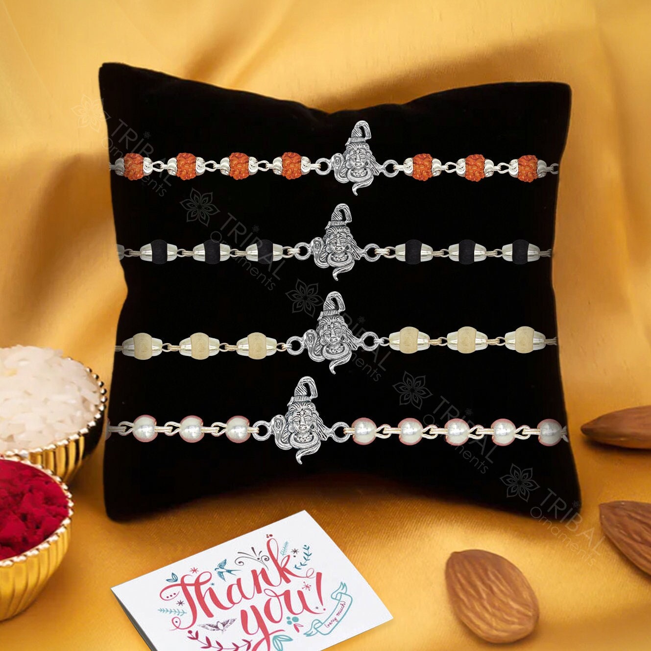 Sterling silver Lord Shiva Rudraksha and Tulsi bead bracelet with black, white, and silver beads, stylish and unique design.
