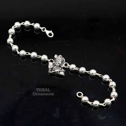 Sterling silver Lord Krishna bracelet with intricate design, personalized for gifting, by TRIBAL ORNAMENTS.
