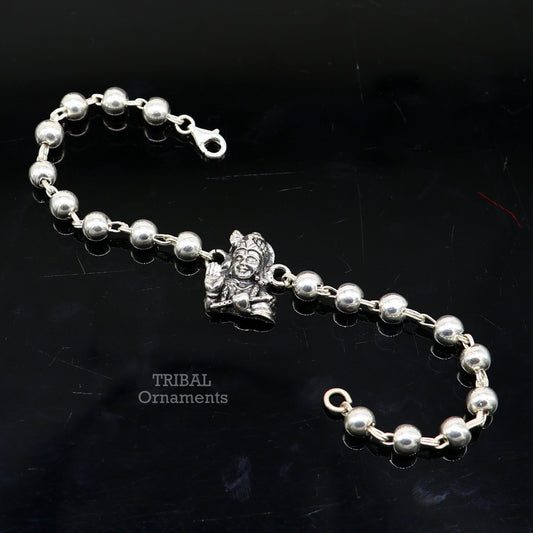 Sterling silver Lord Krishna bracelet with intricate design, personalized for gifting, by TRIBAL ORNAMENTS.