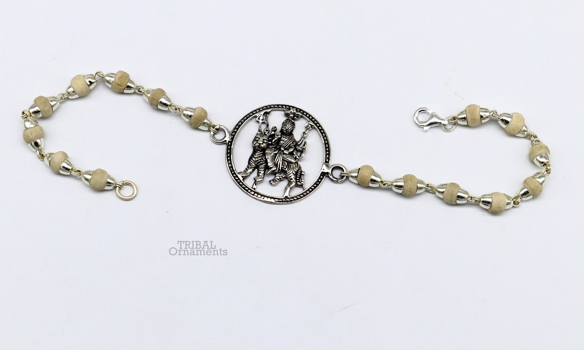 Sterling silver Bhawani Mata deity bracelet with Tulsi bead accents, crafted by Tribal Ornaments, featuring intricate divine design.