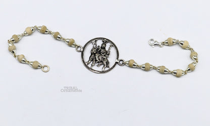 Sterling silver Bhawani Mata deity bracelet with Tulsi bead accents, crafted by Tribal Ornaments, featuring intricate divine design.