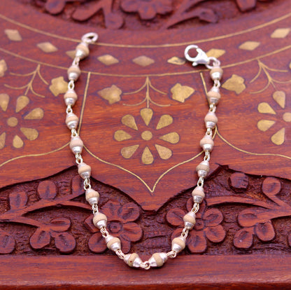 Sterling silver handmade bracelet with basil rosary beads, unisex long and flexible jewelry piece by Tribal Ornaments.